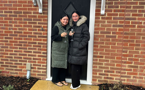 Amy and Britney outside their new home at Beuley View